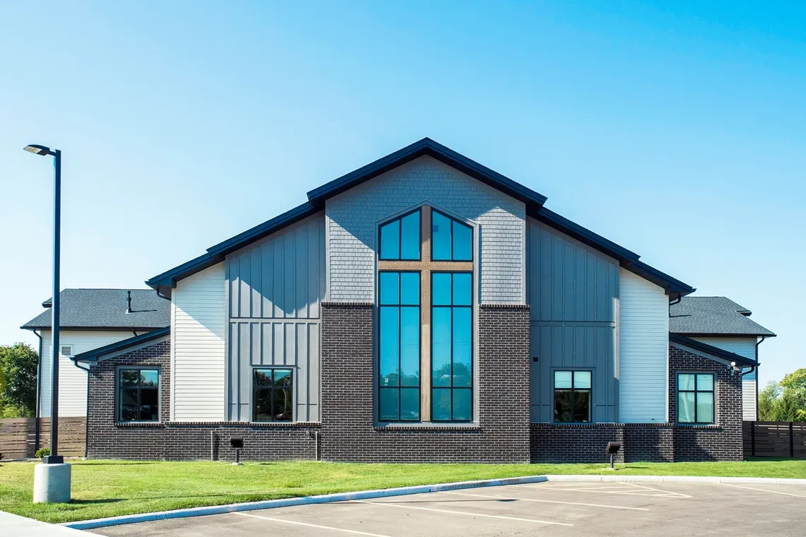 exterior modern glass church daytime 1200x800